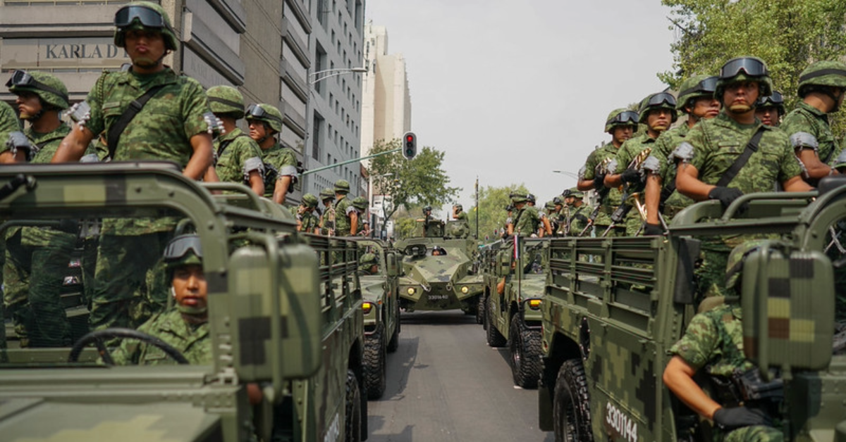 Mexican army soldiers deployed in military vehicles during public security operations in Mexico City